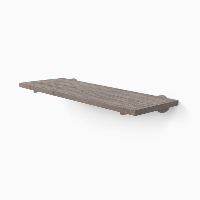 Roderick Hatch Grey Rustic Wall Shelf with textured grey hardwood and subtle round metal floating shelf brackets for functional display