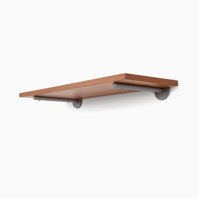 Roderick Mahogany Wall Shelf with warm mahogany finish and discreet arsenic gray metal floating shelf brackets for sleek display