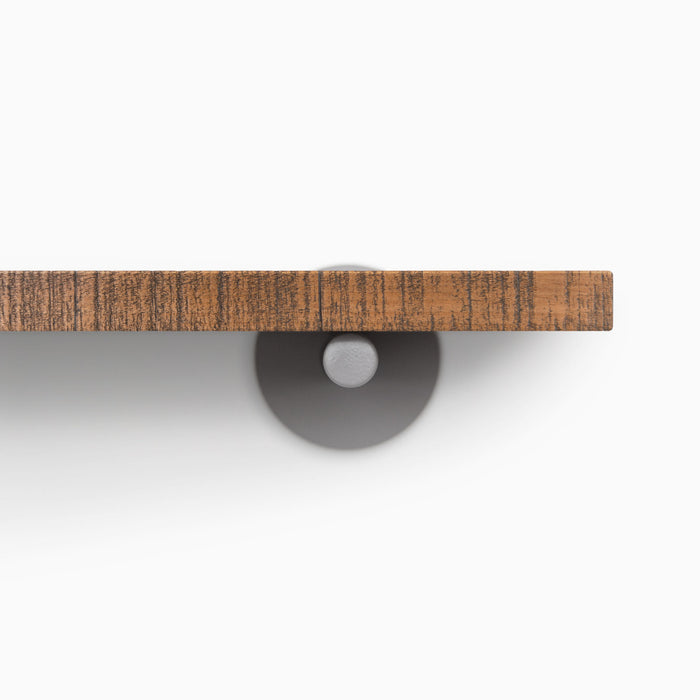 Roderick Nutmeg Rustic Wall Shelf with textured nutmeg hardwood and round arsenic gray metal floating shelf bracket detail