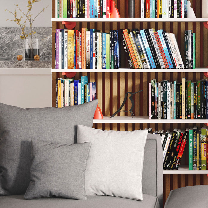 Roderick Concretey Wall Shelf with warm wood finish and sturdy brackets holding a colorful array of books for organized display