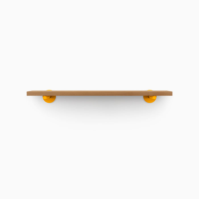 Roderick Nutmeg Wall Shelf with smooth nutmeg hardwood and round orange metal floating shelf brackets for bold wall display
