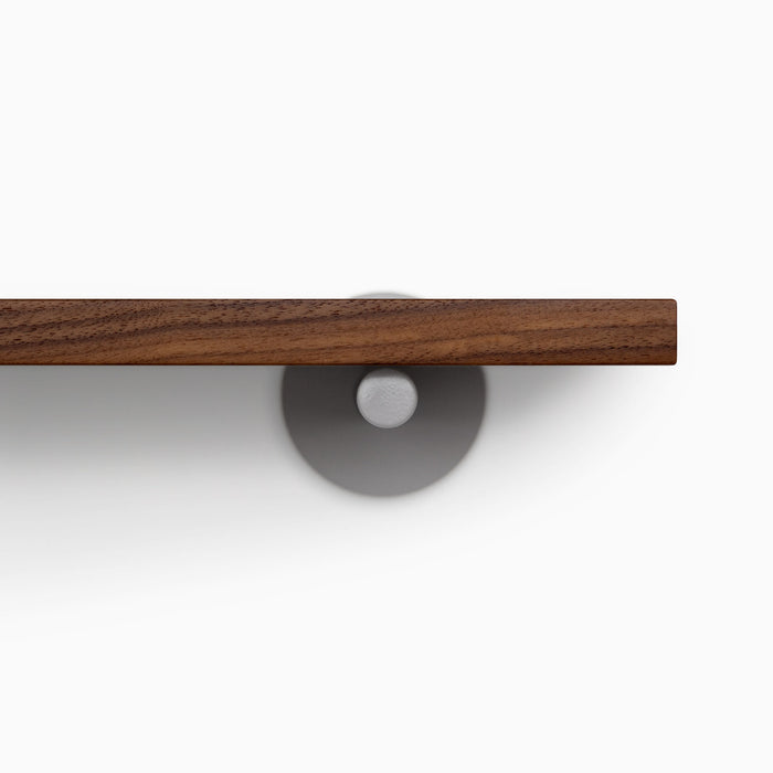 Roderick Walnut Wall Shelf with walnut glue-up and sleek arsenic gray metal floating shelf brackets for modern display