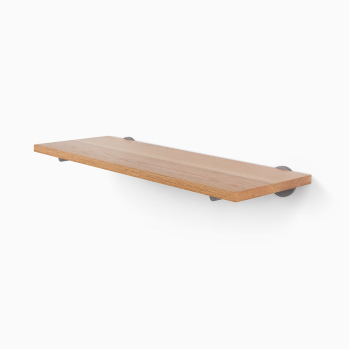 Roderick White Oak Wall Shelf with smooth white oak glue-up and discreet arsenic gray metal floating shelf brackets for sleek display