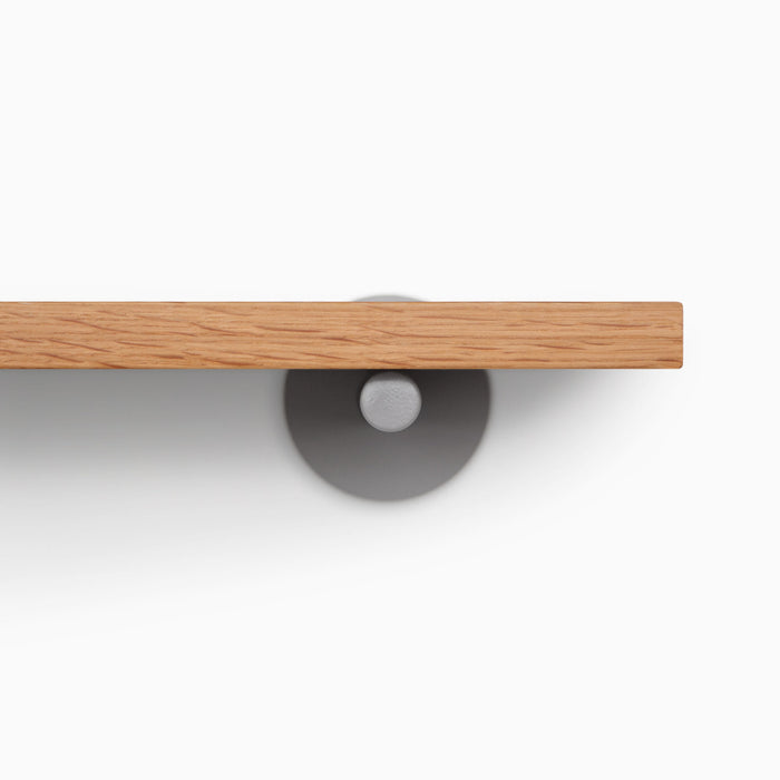 Roderick White Oak Wall Shelf with smooth white oak edge and discreet arsenic gray metal floating shelf bracket