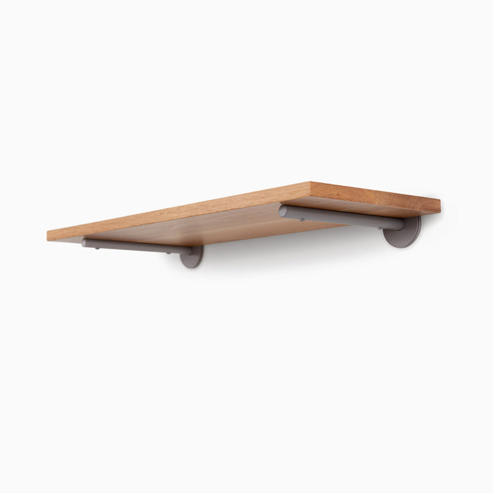 Roderick White Oak Wall Shelf with smooth white oak glue-up and discreet arsenic gray metal floating shelf brackets for sleek display