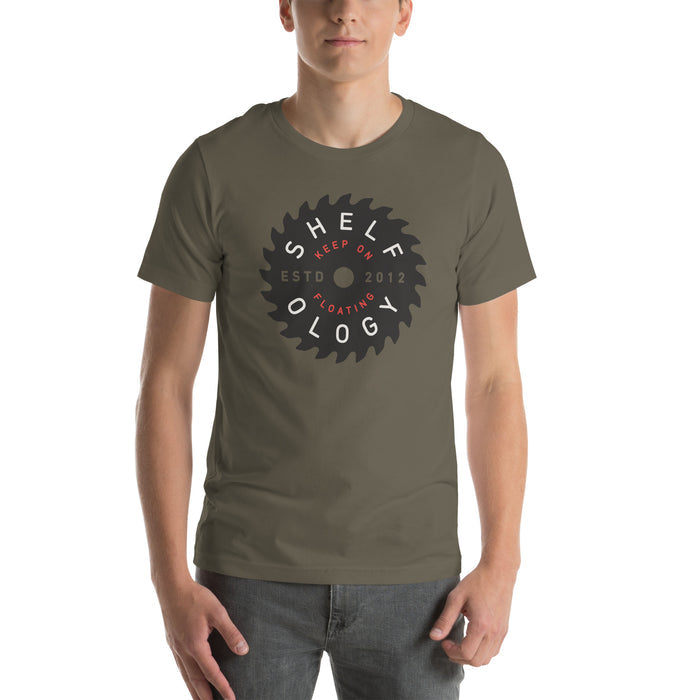 Rough Sawn T-shirt in olive green with circular saw blade graphic and red "Keep on Floating" slogan, unisex fit by Shelfology