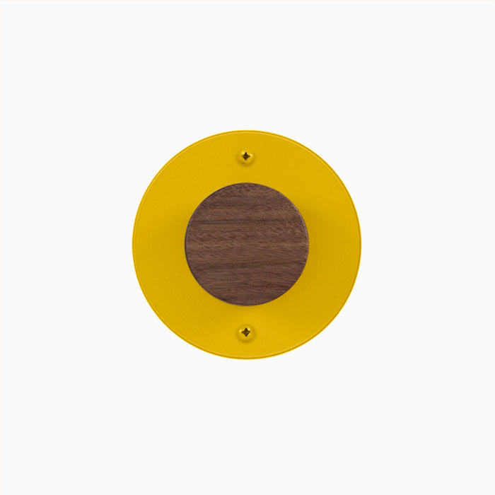 Runda Coat Rack 1 with walnut wood center and vibrant yellow round metal base for modern wall hooks and hangers