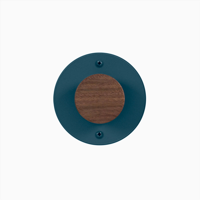 Runda Coat Rack 1 with walnut wood center and muted blue round metal base for minimalist wall hooks and hangers