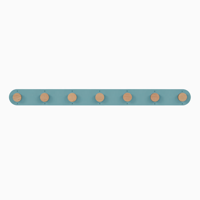 Runda Coat Rack 7 with seven solid wood pegs on a muted blue steel base for functional wall hooks and organization