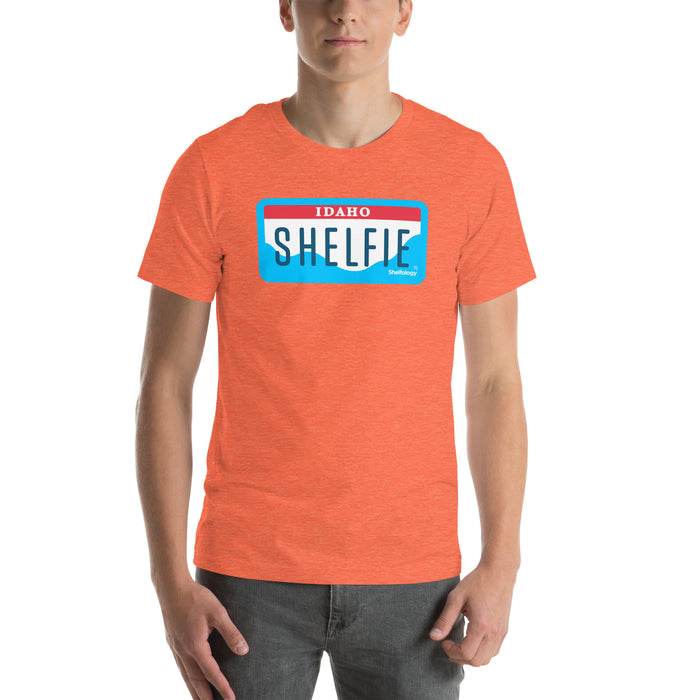 Shelfie T-shirt in heather orange with blue and white Idaho license plate graphic, casual unisex fit by Shelfology