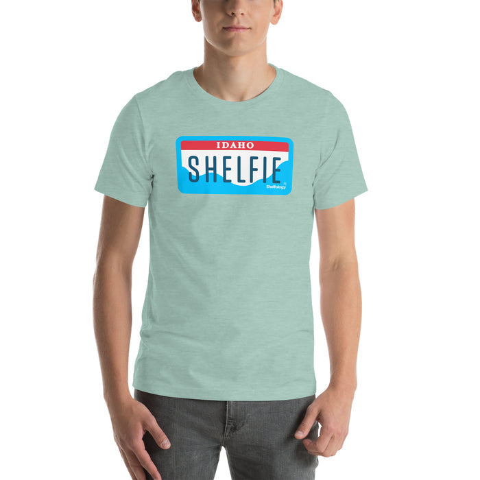 Shelfie T-shirt in dusty blue heather with Idaho license plate-inspired design, comfortable unisex casual fit by Shelfology
