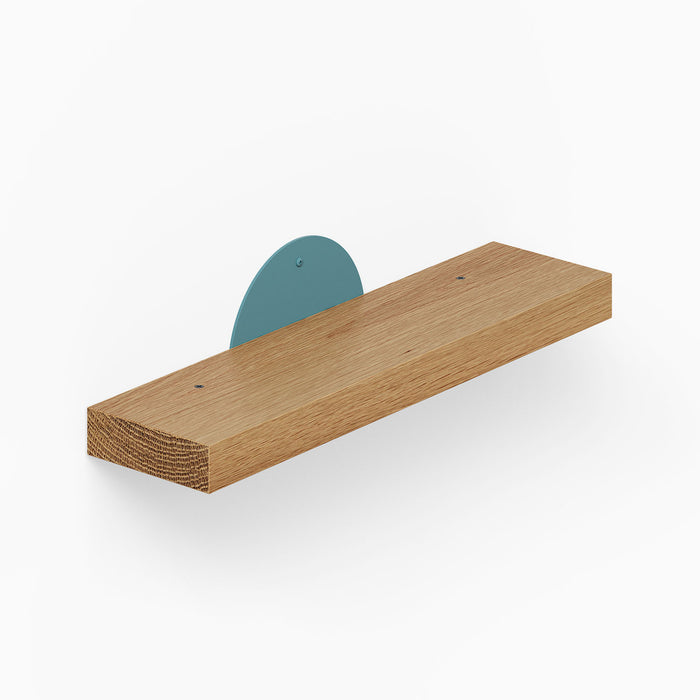 Shortie Deux Wall Shelf featuring a minimalist wood and steel design with mixed-material solid hardwood and matte metal bracket for versatile wall display.
