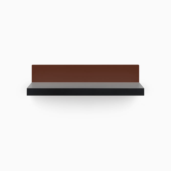 Skaksel Black Floating Shelf with solid black ledge and contrasting rust-colored steel mount for modern wall display and organization