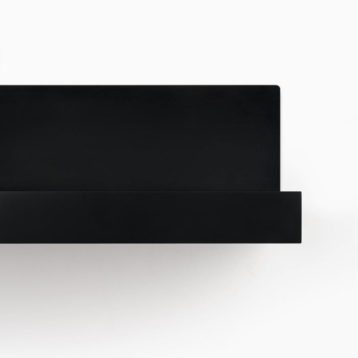Skaksel Black Floating Shelf with solid black ledge and sturdy steel mount for modern wall display and organization