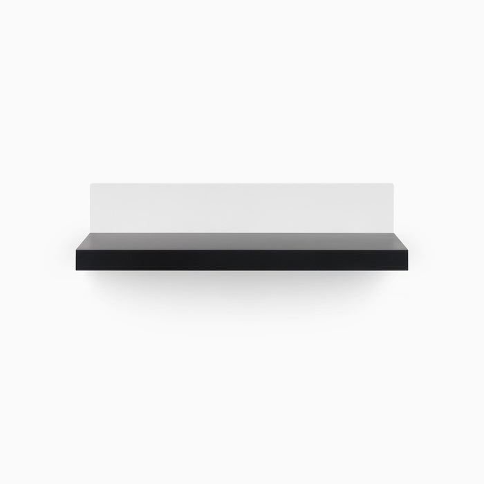Skaksel Black Floating Shelf with solid black ledge and minimalist white steel back panel for modern wall display and organization