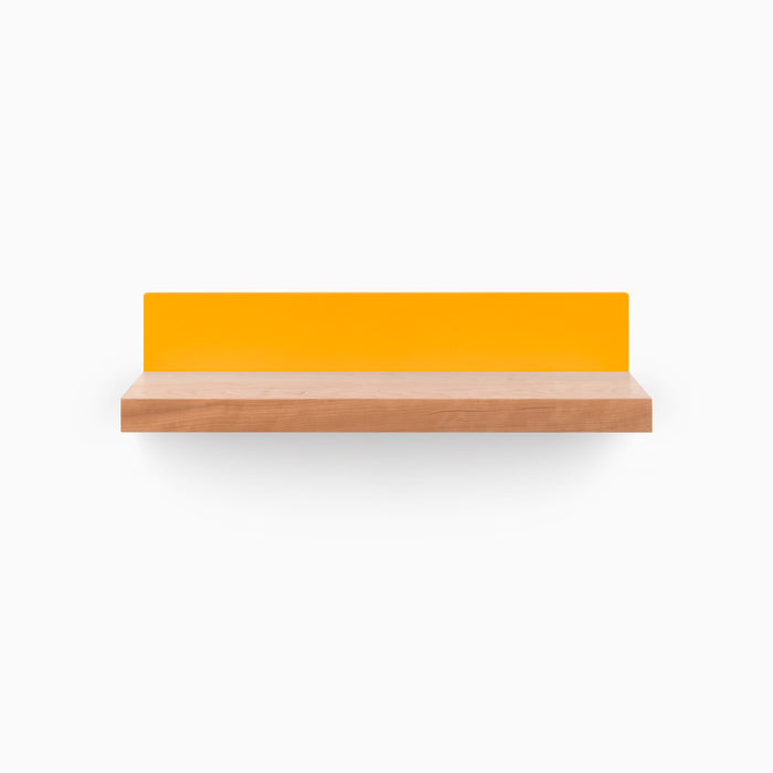 Skaksel Cherry Floating Shelf featuring solid cherry wood with a vibrant orange steel mount for stylish wall display and organization