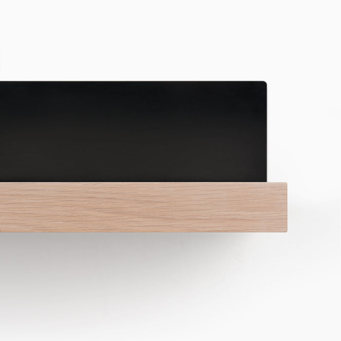 Skaksel Glazed White Oak Floating Shelf with smooth wood ledge and solid matte black steel mount for clean wall display and organization