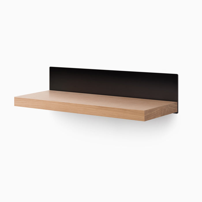 Skaksel White Oak Floating Shelf with a solid white oak ledge and matte black steel mount for stylish wall display and organization