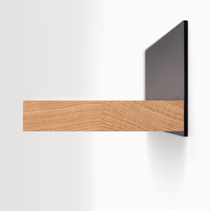 Skaksel White Oak Floating Shelf with solid white oak ledge and matte black steel mount for minimalist wall display and organization