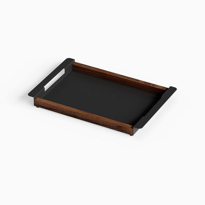 Slide Serving Tray featuring mixed-material design with a solid hardwood walnut frame and matte black steel base and handles for elegant serving.