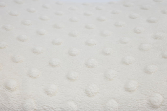 close up texture of cream pillowcase