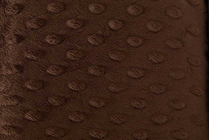 Close-up of a brown textured fabric surface