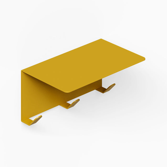 Minimalist mustard yellow metal wall shelf with three integrated coat hooks, designed for functional organization and display - Splendid Shelf + Coat Hooks.