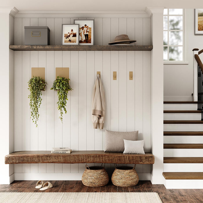 Steddy FM Floating Bench Bracket supporting rustic wood bench in minimalist entryway with hanging hooks and shelf above