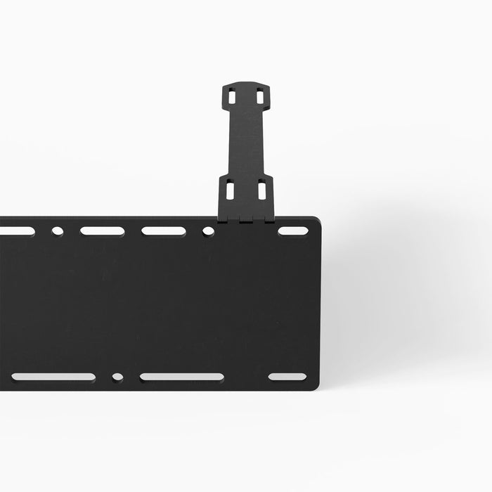 Sturdy black steel Steddy FM Floating Bench Bracket with a minimalist design and multiple mounting slots for versatile wall shelf support.