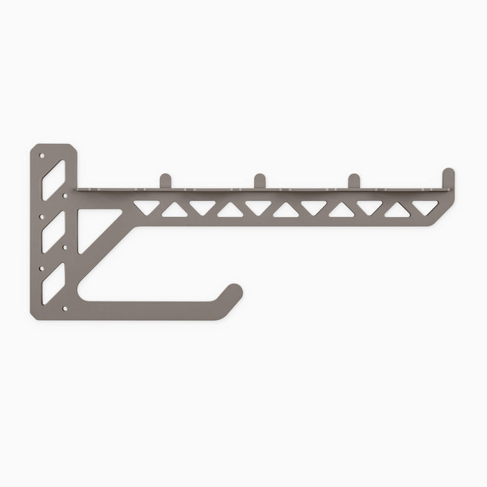 Studly 2x4 Utility Bracket in gray steel with durable support for heavy-duty floating shelf hardware and wall organization by Shelfology