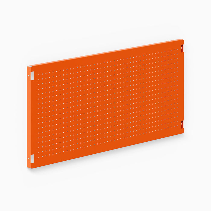 Studly Wall Storage System Pegboard Panel in vibrant orange powder-coated steel, offering durable, functional wall organization for tools and gear.