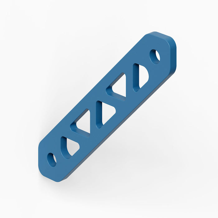 Studly Wall Storage System Steel Shelf Bracket in blue powder-coated steel, engineered for strong, reliable support and seamless integration with floating shelves.