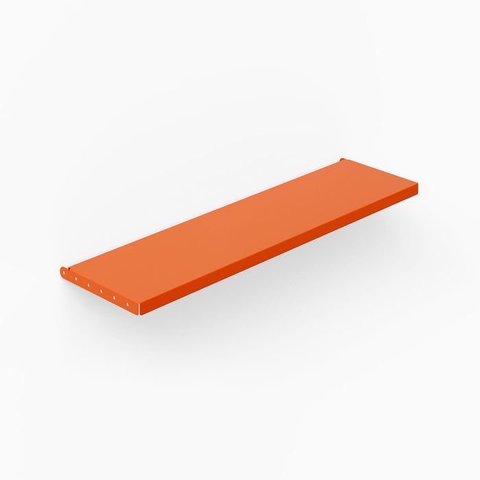 Studly Wall Storage System Steel Shelf in vibrant orange powder-coated steel, offering a sturdy and minimalist floating shelf solution for versatile wall display and organization.