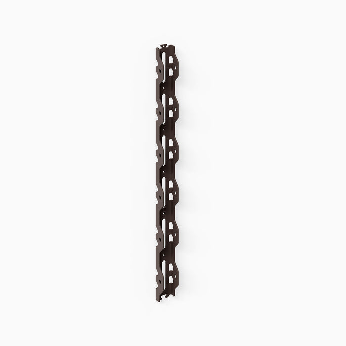 Studly Wall Storage System Vertical Rail in dark powder-coated steel, designed as the sturdy backbone for customizable wall organization and display by Shelfology.