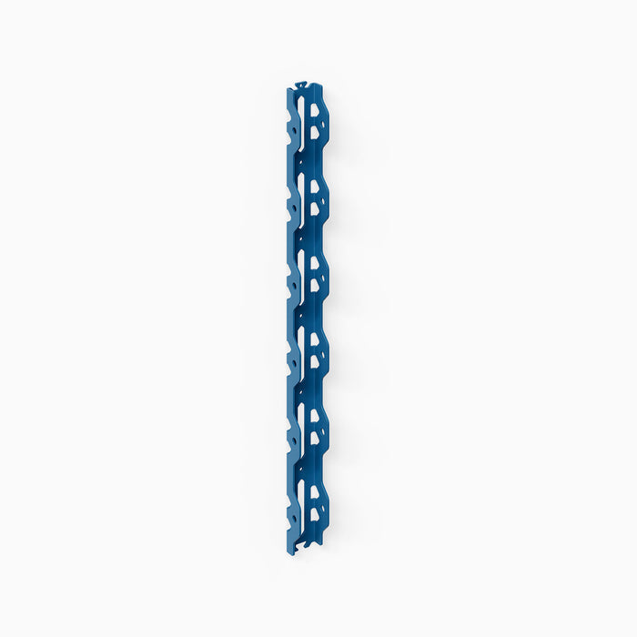 Studly Wall Storage System Vertical Rail in durable powder-coated steel finished in deep blue, forming the sturdy foundation for modular wall storage and display by Shelfology, designed to organize and showcase belongings with minimalist American craftsmanship.