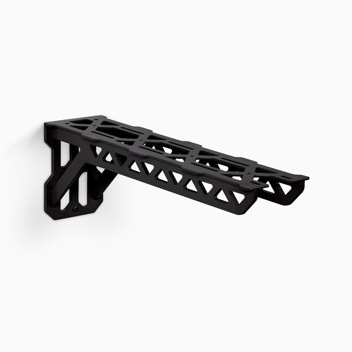 Studly Workbench Utility Bracket in black steel with an industrial low-profile design for durable shelf support by Shelfology