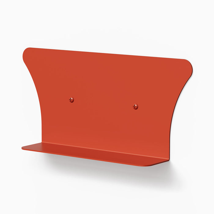Tony Tony Tony Concave Shelf in rust-red steel with minimalist curved design for stylish wall display and organization