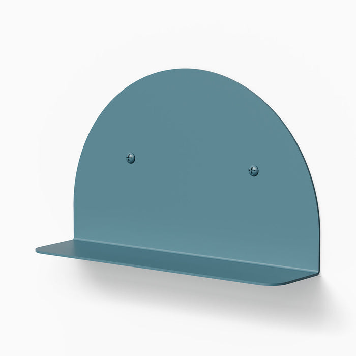 Tony Tony Tony Convex Shelf in blue steel with smooth curved back for minimalist wall display and storage solutions