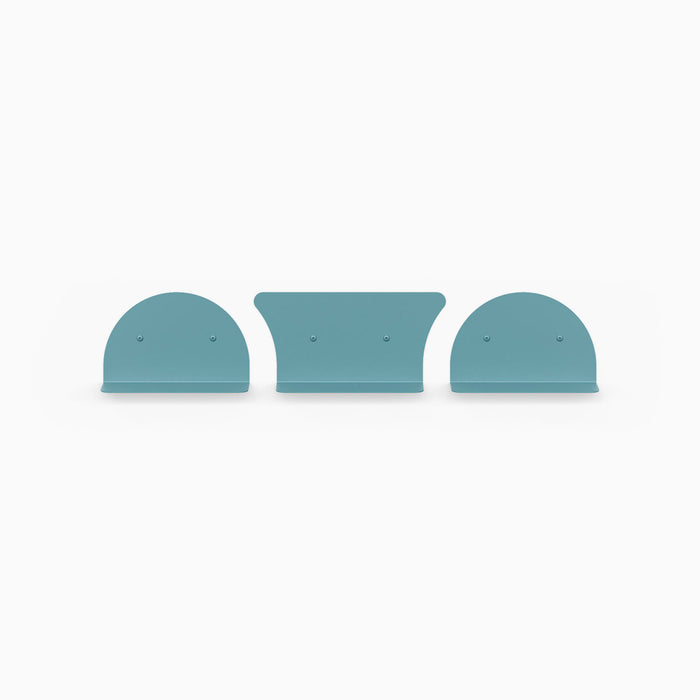 Tony Tony Tony Shelf Bundle with steel convex and concave floating shelf brackets in steely blue for wall display