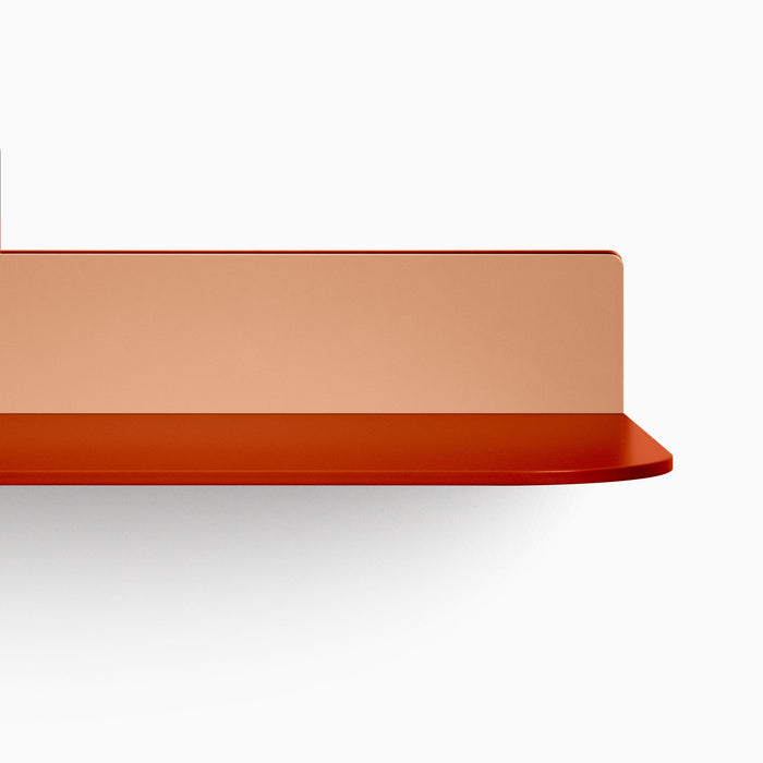Tromso RADius FM3 Steel Floating Shelf in muted terracotta with curved steel ledge and minimalist wall display by Shelfology
