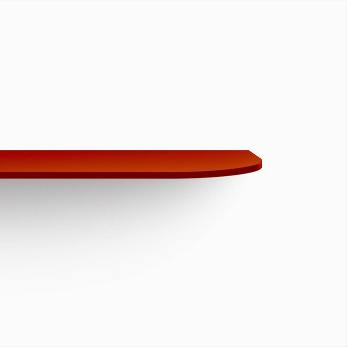 Tromso RADius Steel Floating Shelf in soft terracotta steel with smooth curved edge design for modern wall display by Shelfology