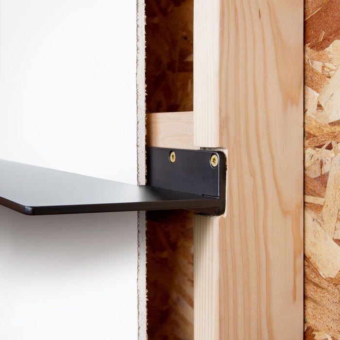Tromso Steel Floating Shelf in black steel with recessed mounting bracket installed into wooden frame for hidden support by Shelfology