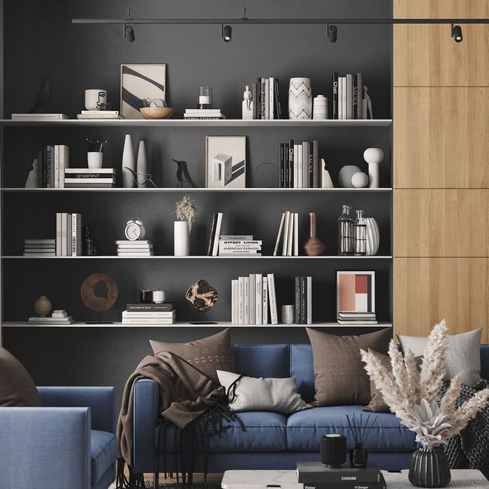 Tromso Steel Floating Shelf in light gray steel with inset mounting holding books and minimalist decor in modern living room by Shelfology