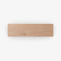 Unfinished Alder Wood Slab showcasing natural grain and smooth surface, crafted from solid hardwood for custom floating shelves and display ledges.