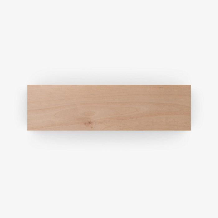 Unfinished Alder Wood Slab showcasing natural grain and smooth surface, crafted from solid hardwood for custom floating shelves and display ledges.
