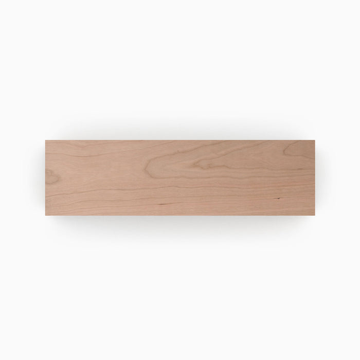 Unfinished Cherry Wood Slab in solid hardwood, custom-cut with precise dimensions, ideal for creating minimalist floating shelves and display ledges.