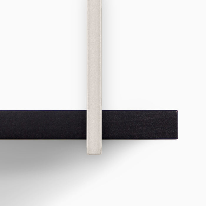 Verne Black 5 Tiered Shelf showcasing black wood ledge with light metal floating shelf bracket detail in minimalist style