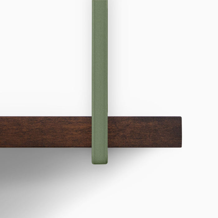 Verne Espresso Tiered Shelf close-up of dark espresso wood ledge with muted green metal floating shelf bracket for display and storage