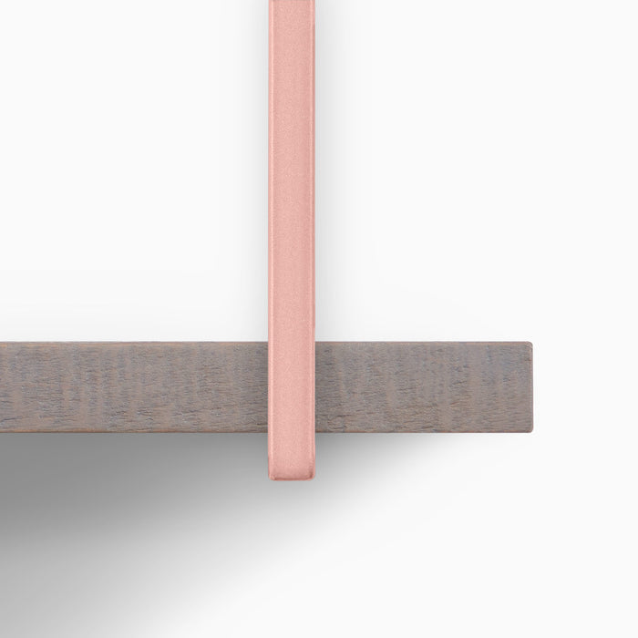 Verne Hatch Grey Rustic 5 Tiered Shelf close-up showing weathered grey wood ledge with soft pink metal floating shelf bracket