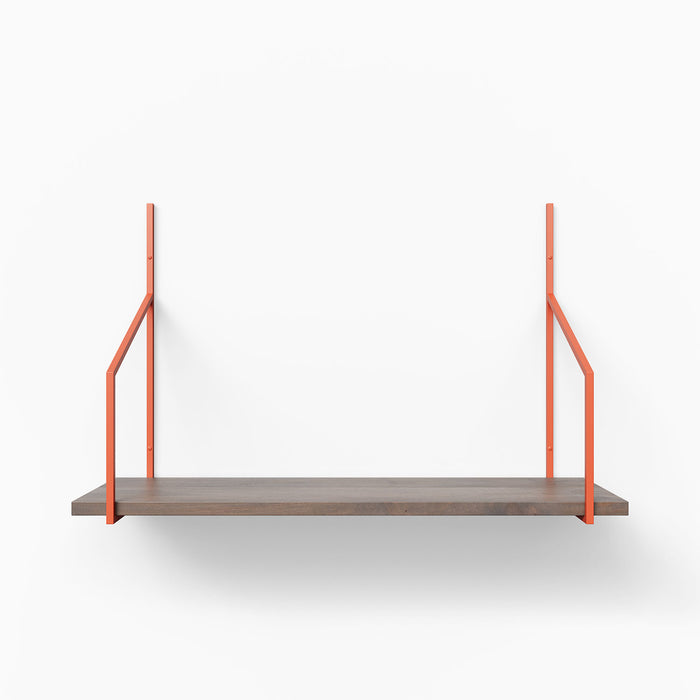Verne Hatch Grey Tiered Shelf with dark grey wood ledge and bold muted pink metal floating shelf brackets for modern wall display